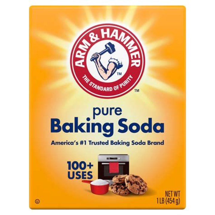 A box of baking soda might cover it up in a refrigerator