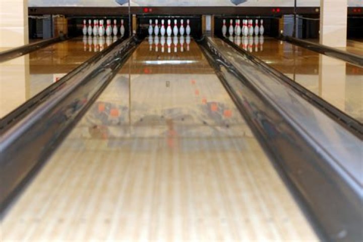 Bowling spot with gutters on both sides