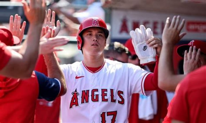 Center fielder for the Angels who won his third American League MVP award in 2019: 2 wds.