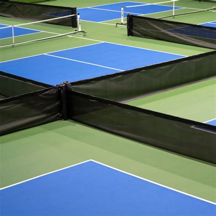 Court dividers in racket sports