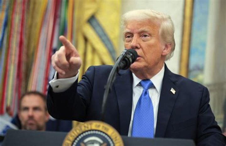 ___ cry from (not at all like): 2 wds.