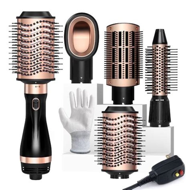 Curling ___ (hairstyling tool)
