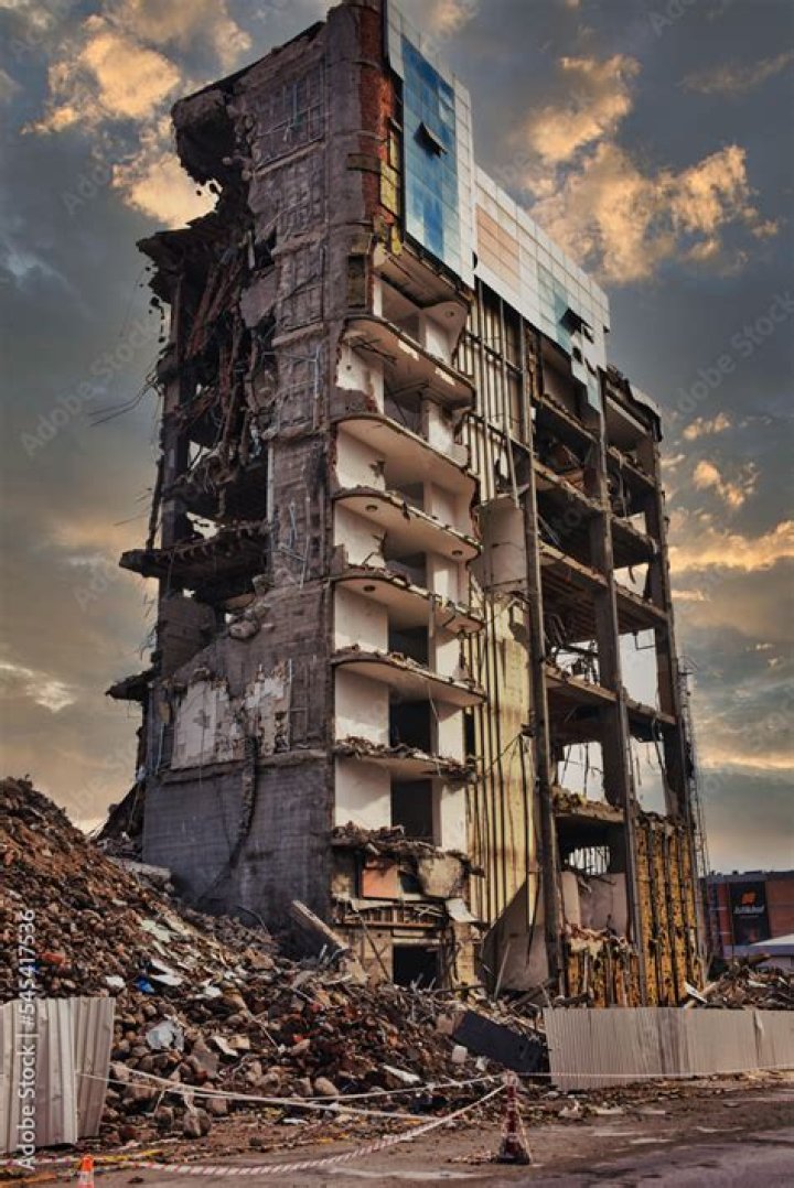 Destroy completely as a condemned building