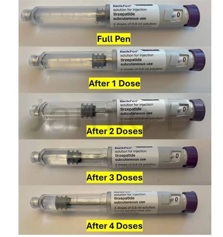 Fluid in a pen Crossword Clue
