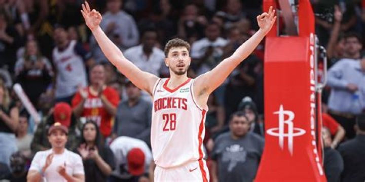 Former Rockets center who is the team's all-time leader in points rebounds blocks and steals: 2 wds.