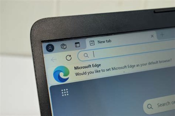 Gets a view of Crossword Clue