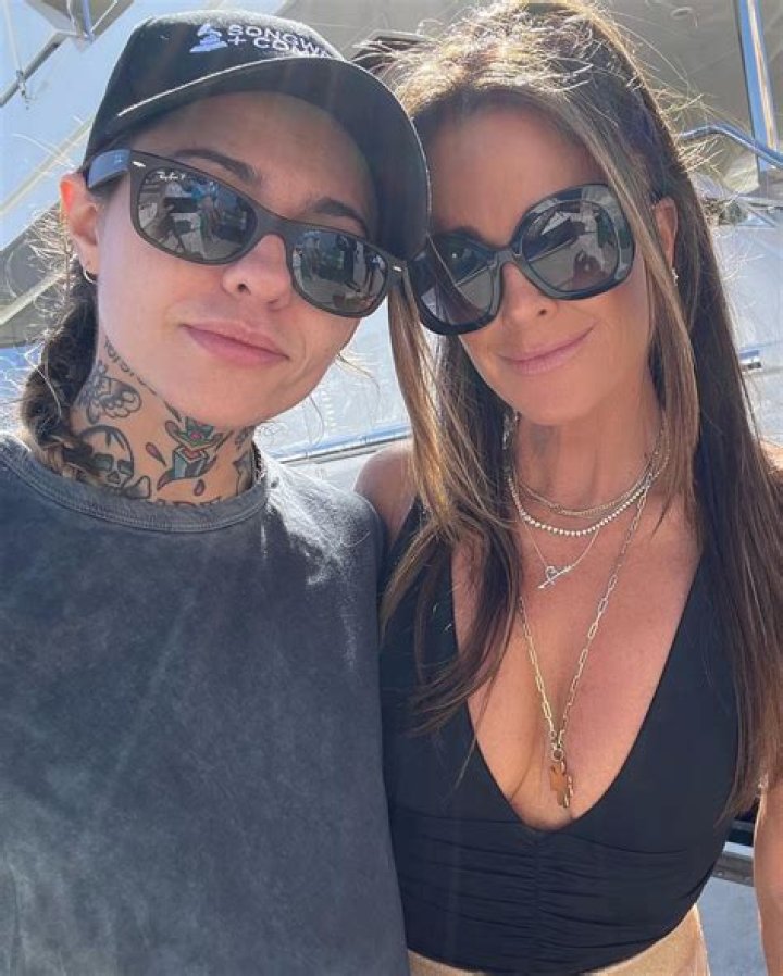 Go ___ (attend a party without a date)