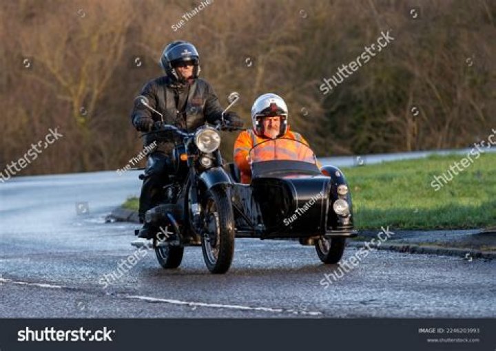 Got on a motorcycle or in a sidecar say