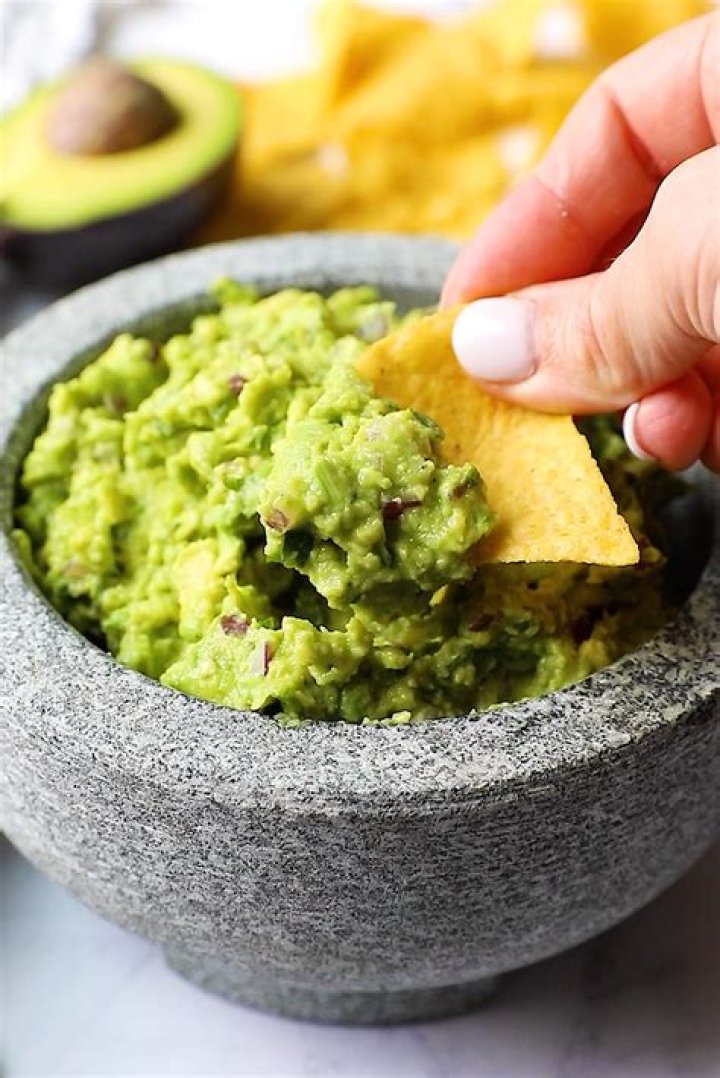 Green fruits in guacamole