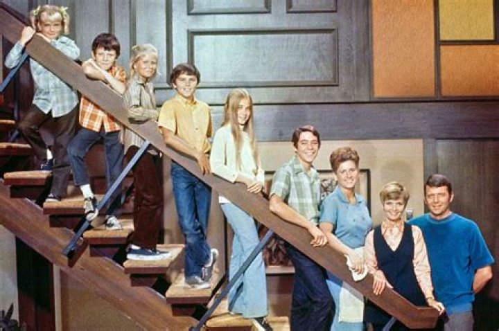 Greg Peter and Bobby to Carol Brady