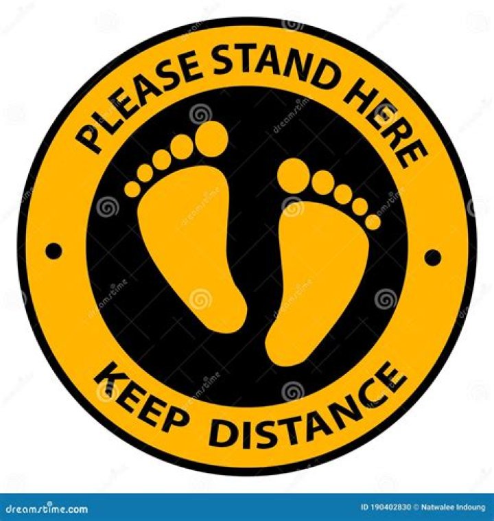 Keep ___ distance (stand back): 2 wds.