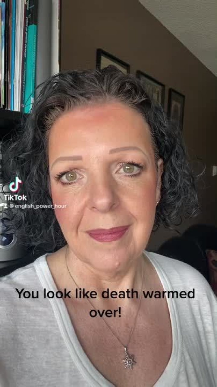 Look like death warmed ___