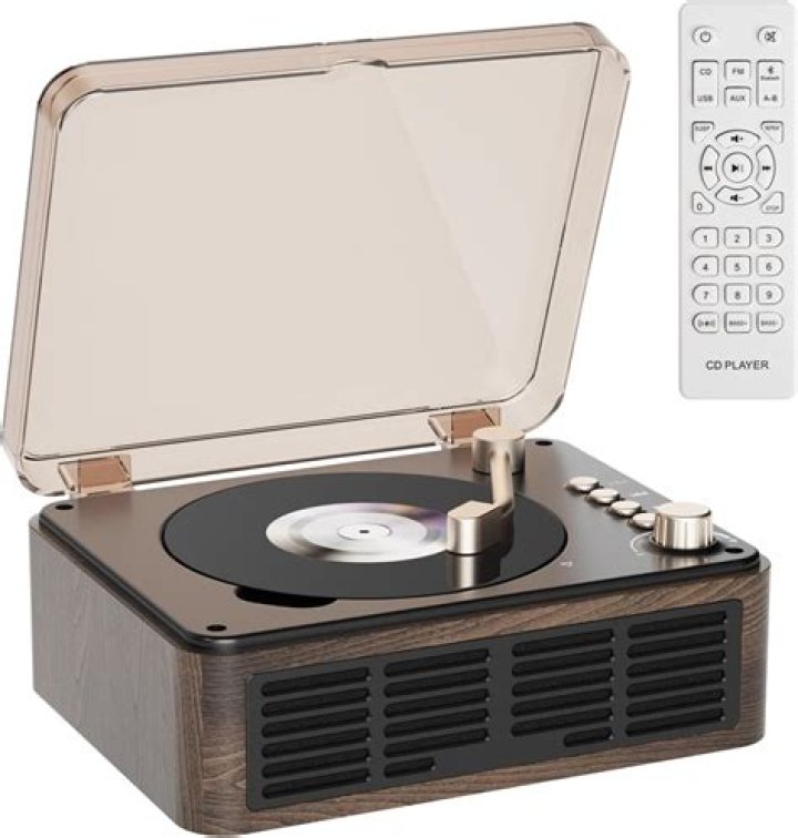 Obsolete tape-playing device: Abbr.