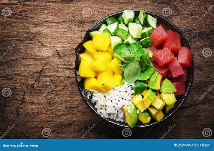 *Poke ___ trendy dish with diced ahi and vibrant veggies you may get in 14a