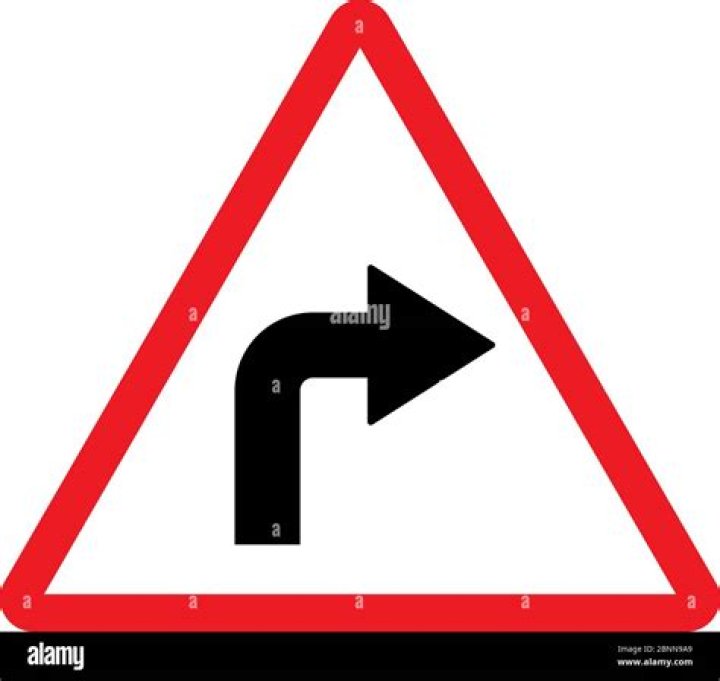 RIGHT TURN ___ (traffic sign)
