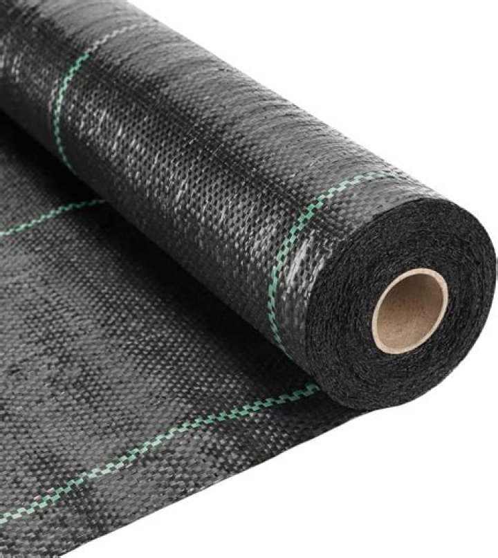 Rolled-up unit of fabric or wallpaper