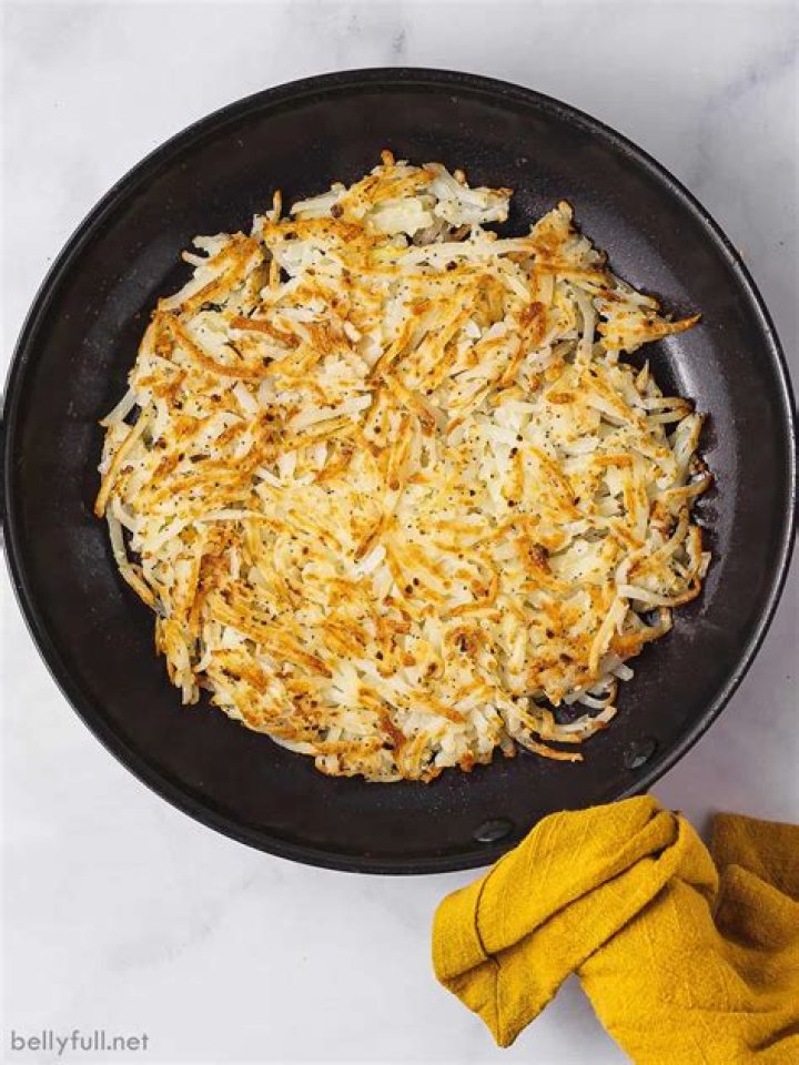 Seasoning sprinkled on hash browns