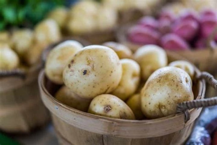 State known for its potatoes: Abbr.