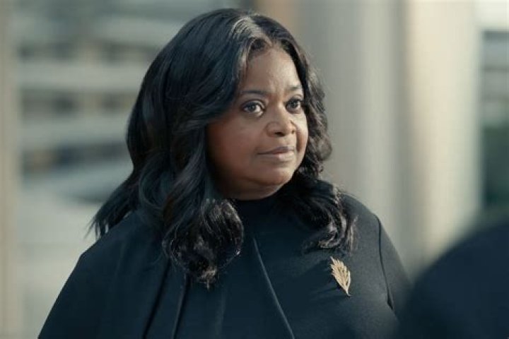 With 19-Across 2017 fantasy film featuring Octavia Spencer as a worker at a secret government lab: 2 wds.