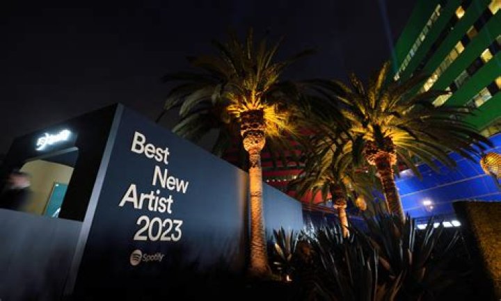 With 32-Across American rapper whose The Box was the #3 song on Spotify in 2020