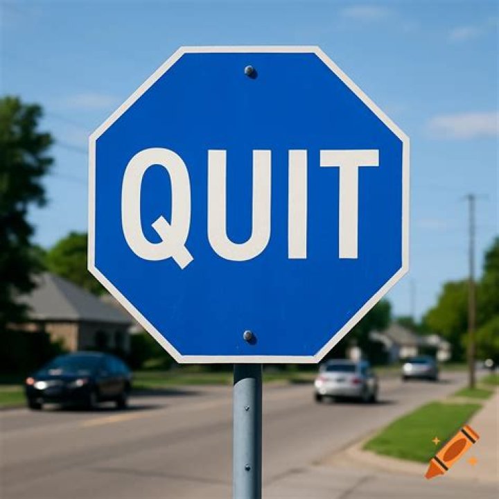 Word on a red octagonal street sign